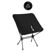 Low back ultralight folding camping chair with storage pouch in khaki color, portable and durable design.